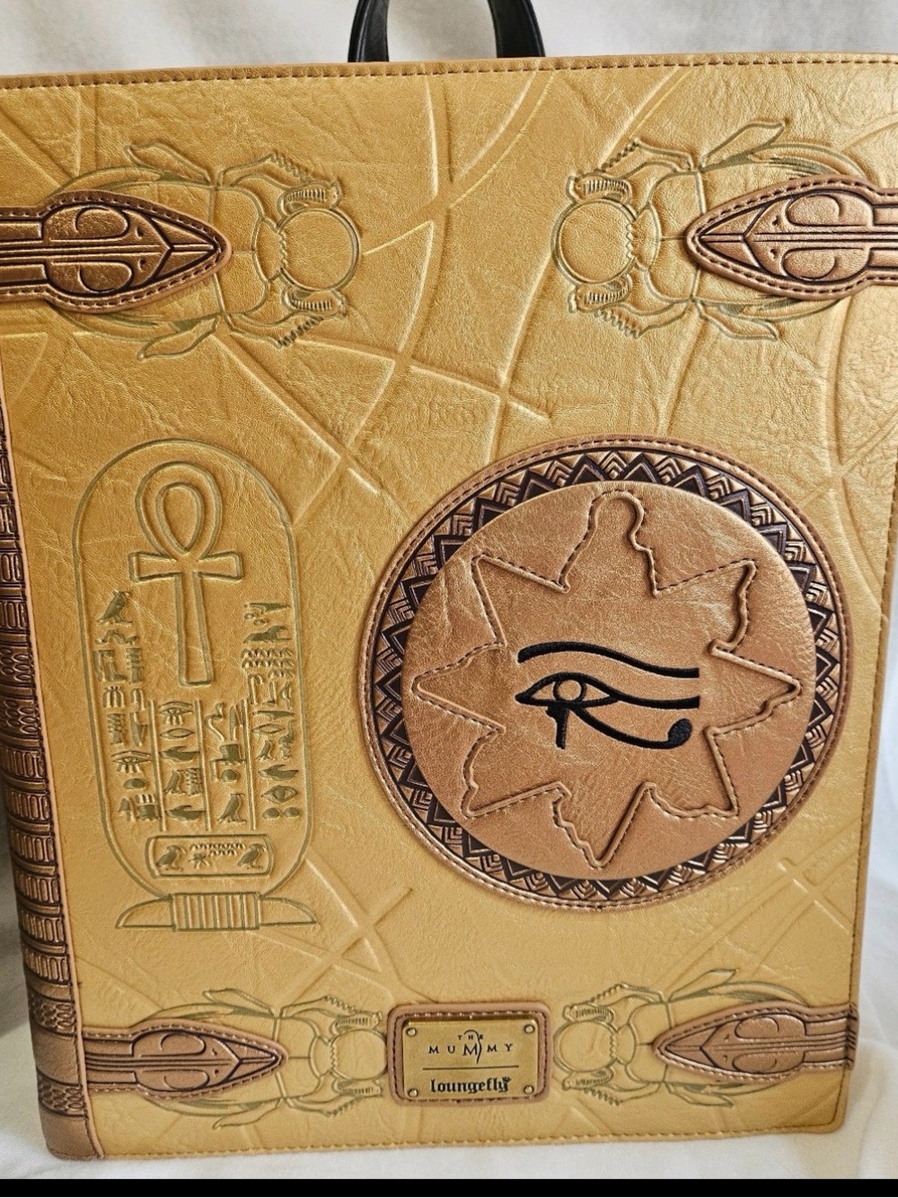 Loungefly Gold Egyptian Eye of Ra Book-Style Backpack
